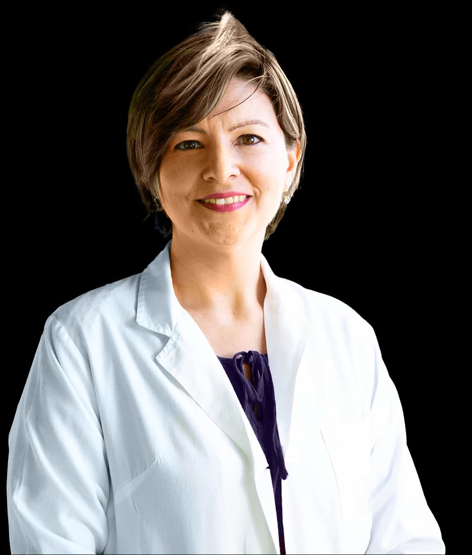 portrait photo of an OBGYN medical practitioner smiling in lab coat