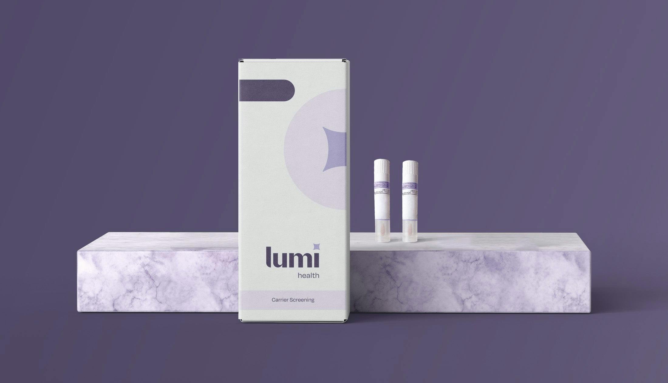a front-on photo of a Lumi Health Comprehensive Carrier Screening kit with two swabs